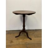 A mahogany wine table, on a column support to a tripod base, 52 cm wide, a Pembroke table, 83 cm