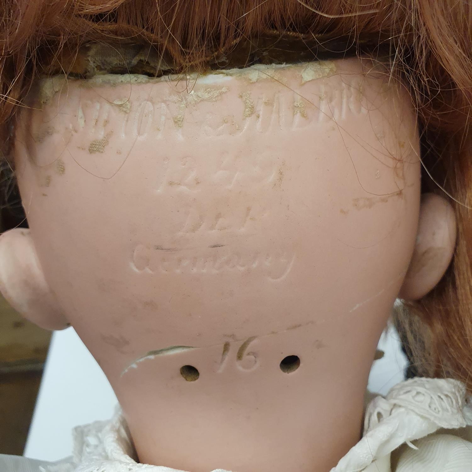 A Simon & Halbig German bisque headed doll, No 1299, with a jointed composite and wood body, 83 cm - Image 5 of 7