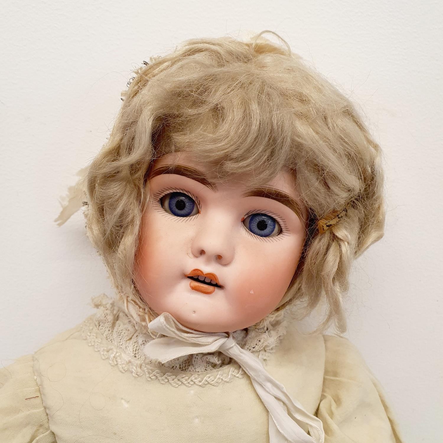 A German bisque headed doll, with jointed composite body and millefiori glass closing eyes, 60 cm - Image 2 of 5