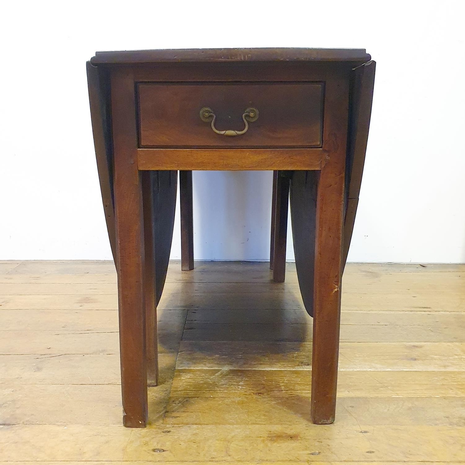 A 19th century mahogany drop leaf dining table, with a single frieze drawer, 132 cm wide - Image 2 of 5