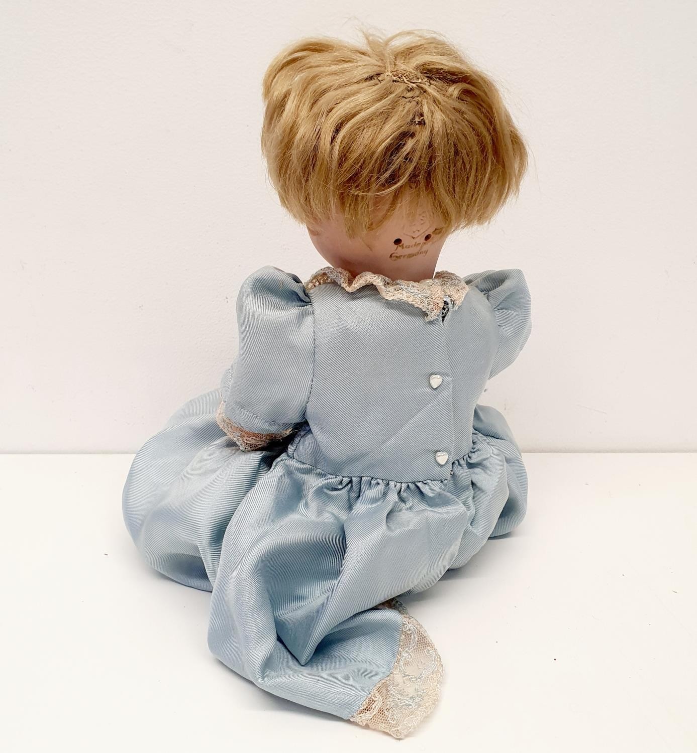 A Bruno Schmidt German bisque headed doll, with a composite body and millefiori glass eyes, 34 cm - Image 3 of 3