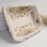 A pair of Cauldon porcelain basins, decorated flowers, 46 cm wide