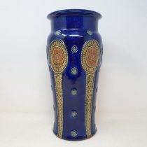 A Royal Doulton vase, decorated oval panels, 32 cm high Various firing faults, no chips cracks or