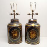 A pair of painted tea type canisters, converted to lamps, 60 cm high (2)