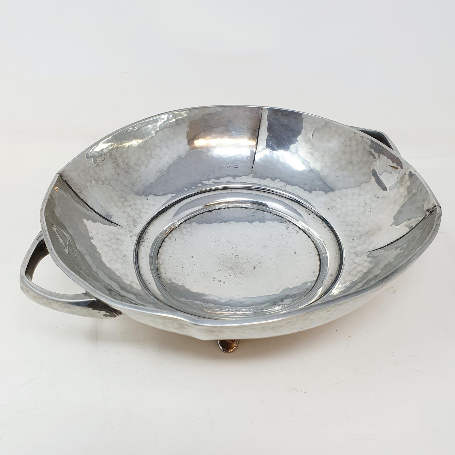 A Period Pewter bowl, by Frank Cobb & Co, 27 cm wide General wear, small split to one of the creases