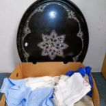 A papier mache and mother of pearl oval tray, 73 x 59 cm, and assorted textiles (qty)