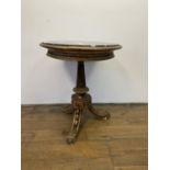 An Empire style carved wood and gesso gilt table, with a marble top, 64 cm diameter Various losses