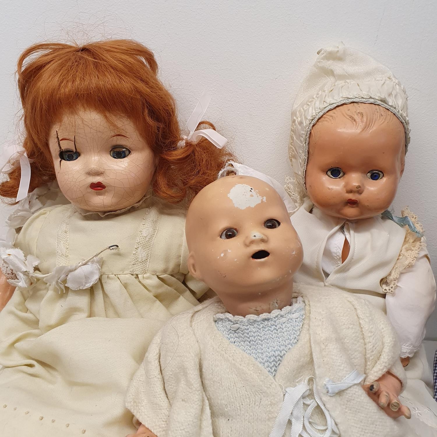 A 1940s composition baby doll, 44 cm, and five other dolls (box) Provenance: From a vast single - Image 2 of 5