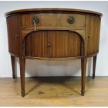 A mahogany demi lune sideboard, with tambour fronted cupboards, 135 cm wide