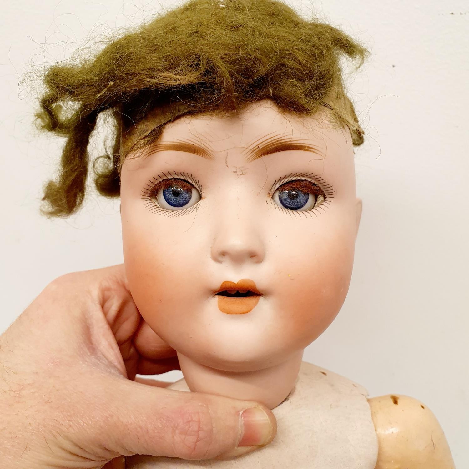 A Simon & Halbig German bisque headed doll, No 1009-6, a composite jointed body, and closing - Image 2 of 4