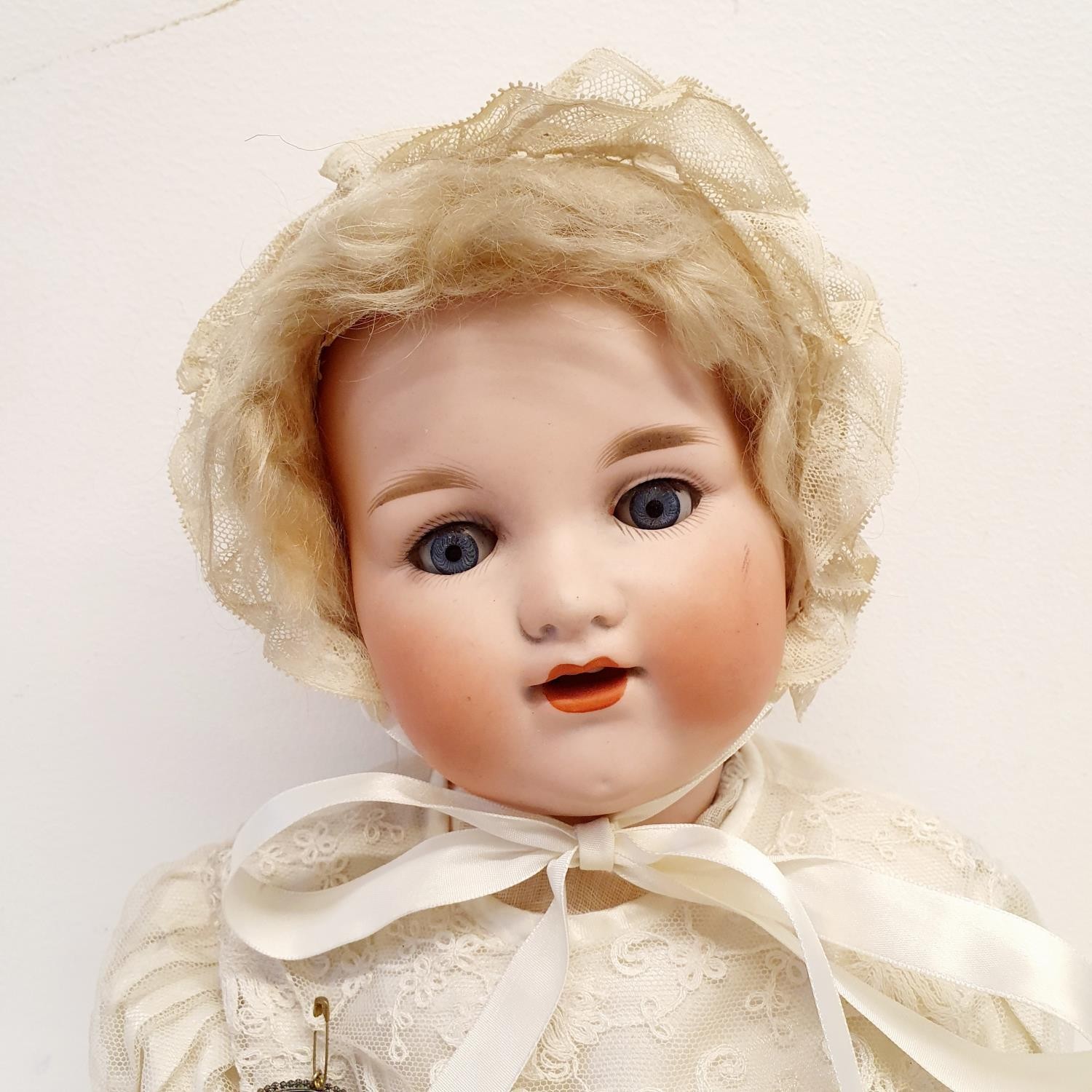 An Armand Marseille German bisque headed doll, No 990, composite body and millefiori glass closing - Image 2 of 5