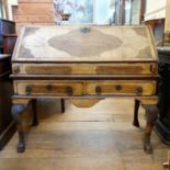 An 18th century style inlaid walnut bureau, the fall front to reveal a fitted interior above two