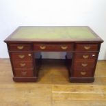 A 19th century mahogany pedestal desk, of a nine drawer configuration, 137 cm wide drawers are not