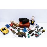 A pair of binoculars, a Martel advertising figure, and assorted toy cars (box)