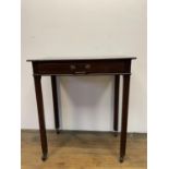 A mahogany sidetable, with a single frieze drawer, 67 cm wide, and a carved oak framed mirror, 103