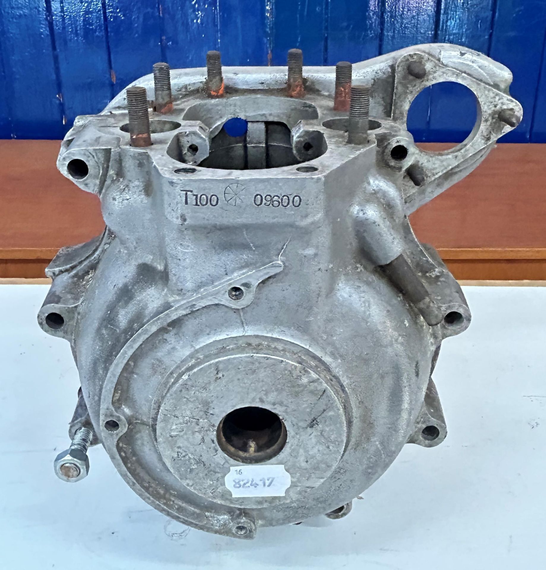 A Triumph T100 motorcycle engine casing, stamped T100 09600