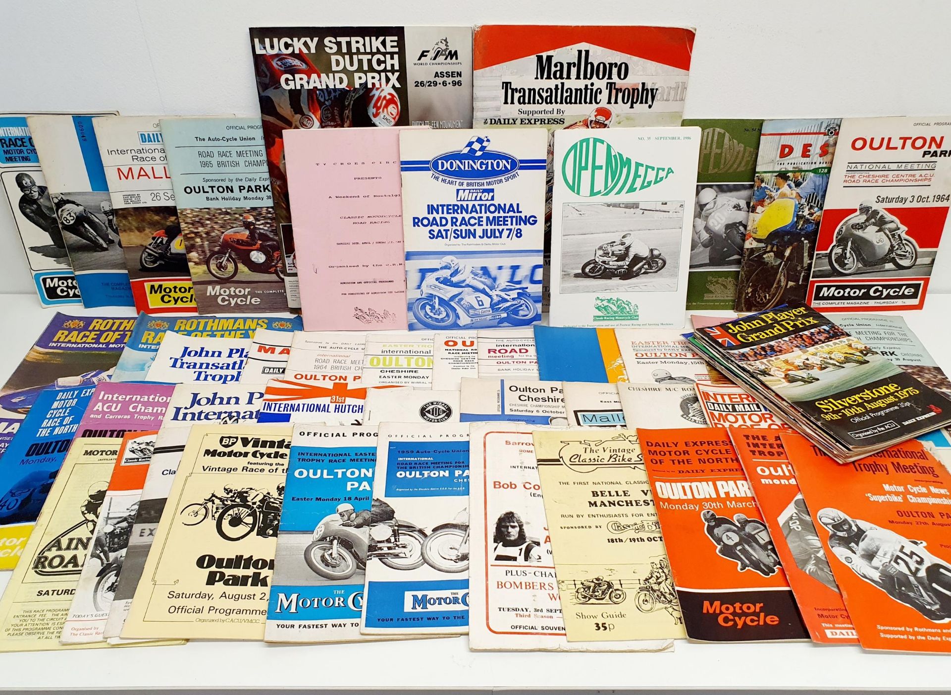 A group of motorcyle racing programmes, 1959-1980s, and a Dutch TT 1996 programme Provenance: From