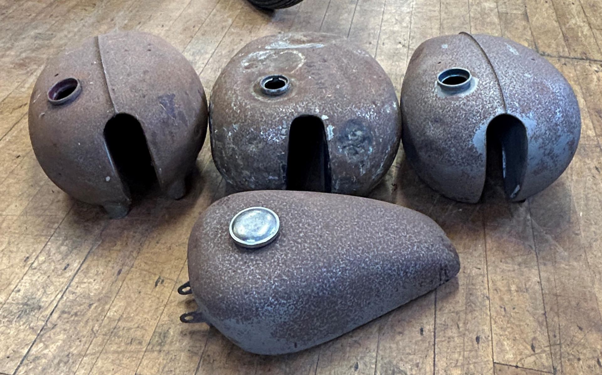 Four classic motorcycle fuel tanks (4)