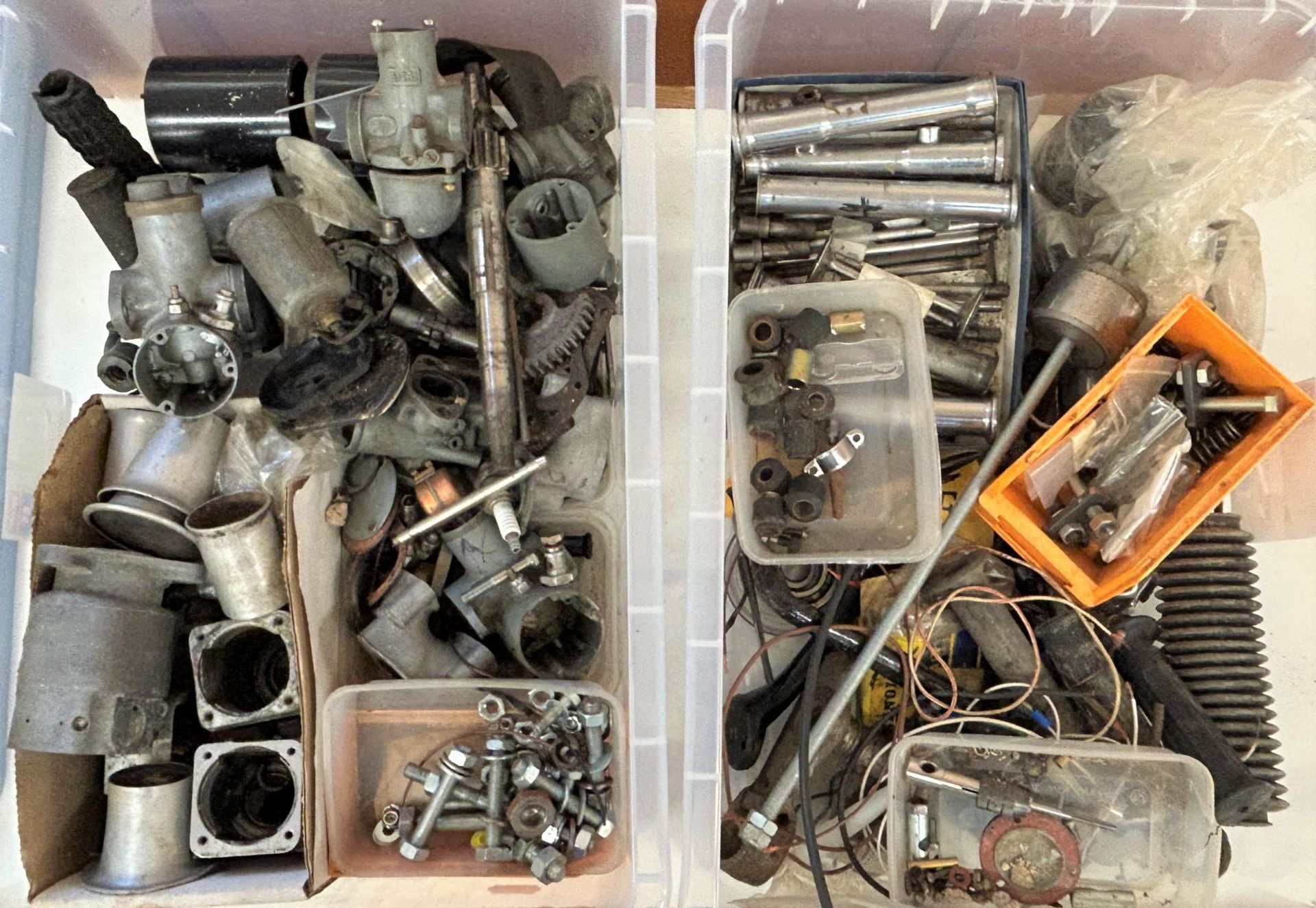 Assorted Triumph motorcycle parts, to include various carburettor and engine parts (2 boxes)
