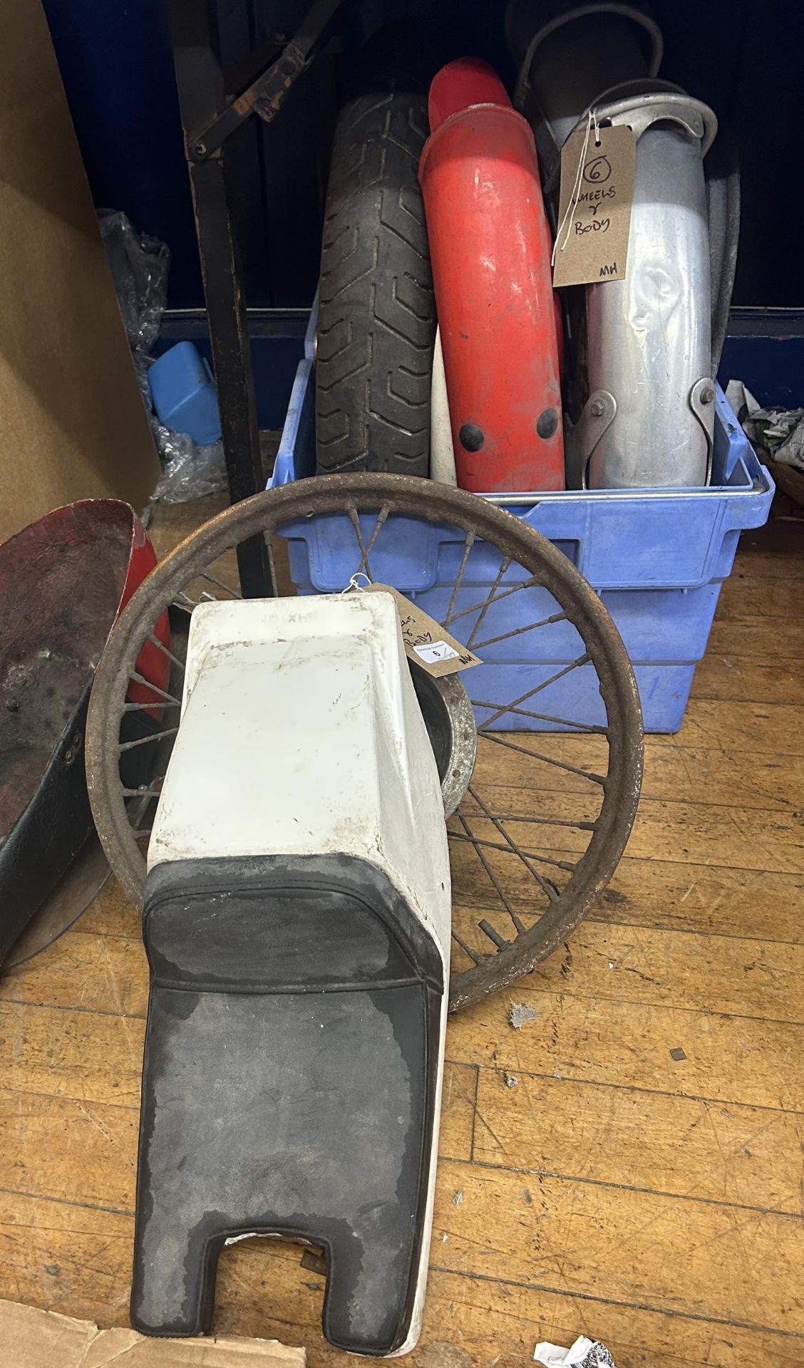 Assorted classic motorcycle wheels, rims and body parts (qty)
