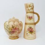 A Royal Worcester blush ivory jug, decorated flowers, 23 cm high and two similar vases (3) The lid
