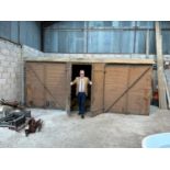 A railway covered goods wagon, painted brown, approx. 17ft 6in long, 7ft 8in wide and 7ft 6in