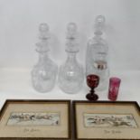 A decanter, engraved CIII, 27 cm high, five other decanters, two glasses, and two Stevenographs (