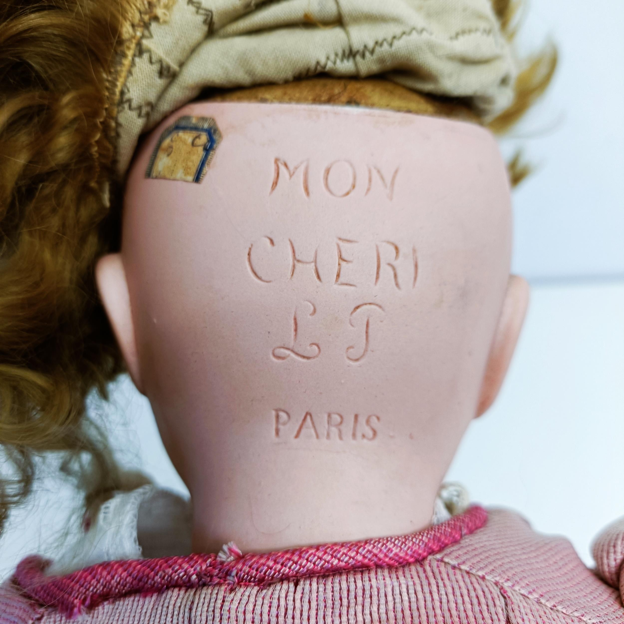 A Louis Leon Piere Mon Cheri French bisque headed doll, with a composite jointed body, and - Image 3 of 4