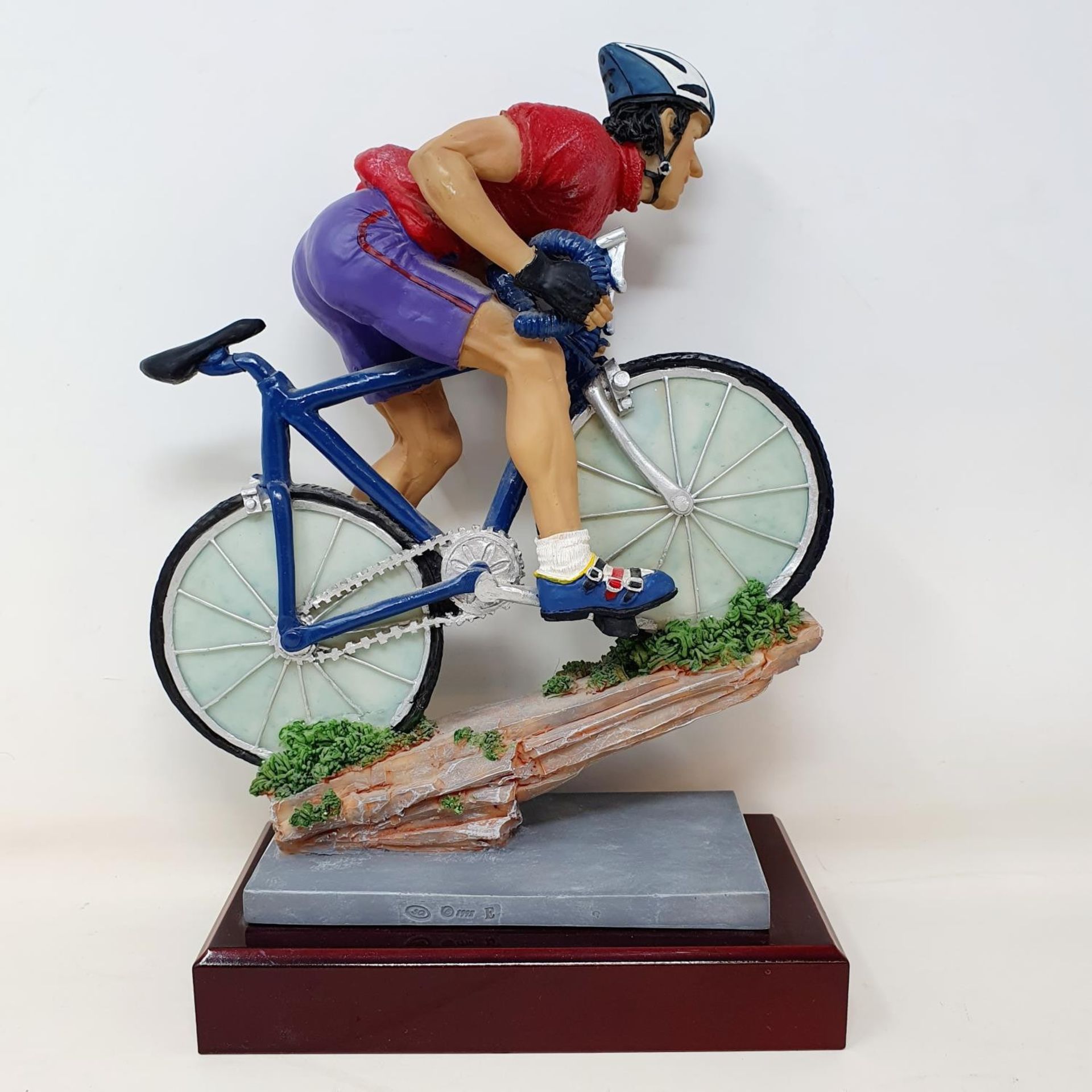 An Italian porcelain cycling trophy, 36 cm high, and a resin Hill Climb trophy in the form of a - Image 4 of 7
