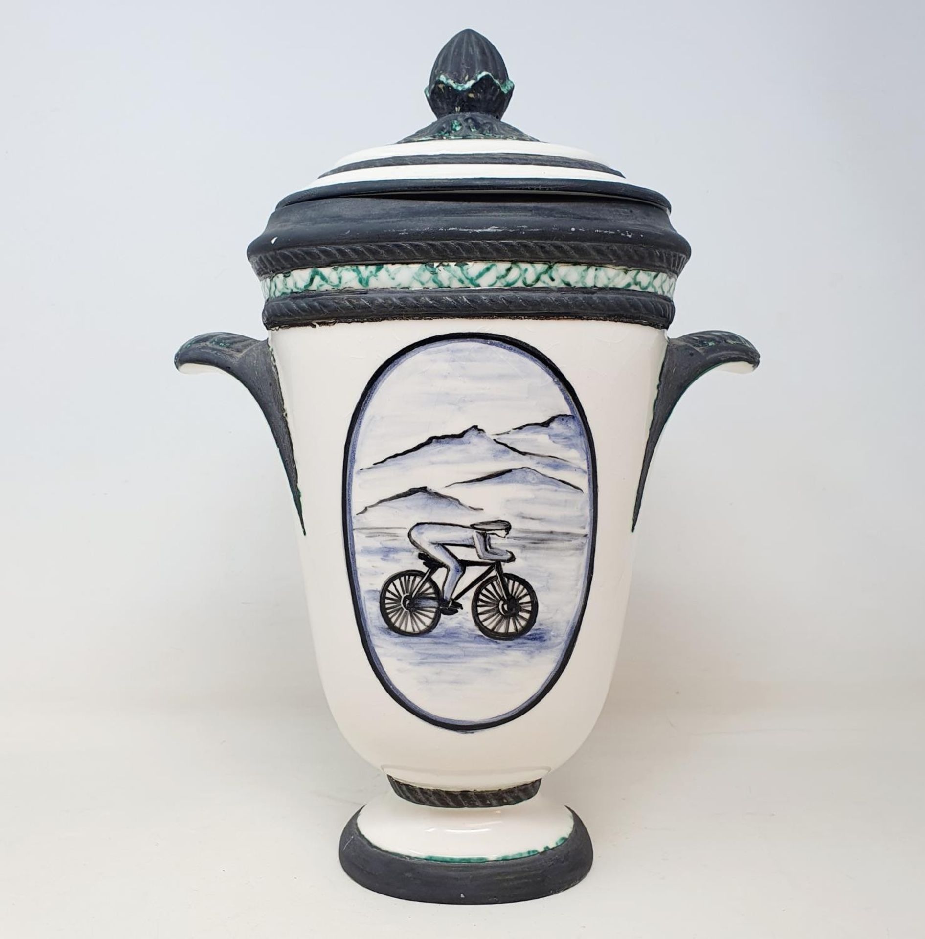 An Italian porcelain cycling trophy, 36 cm high, and a resin Hill Climb trophy in the form of a - Image 2 of 7