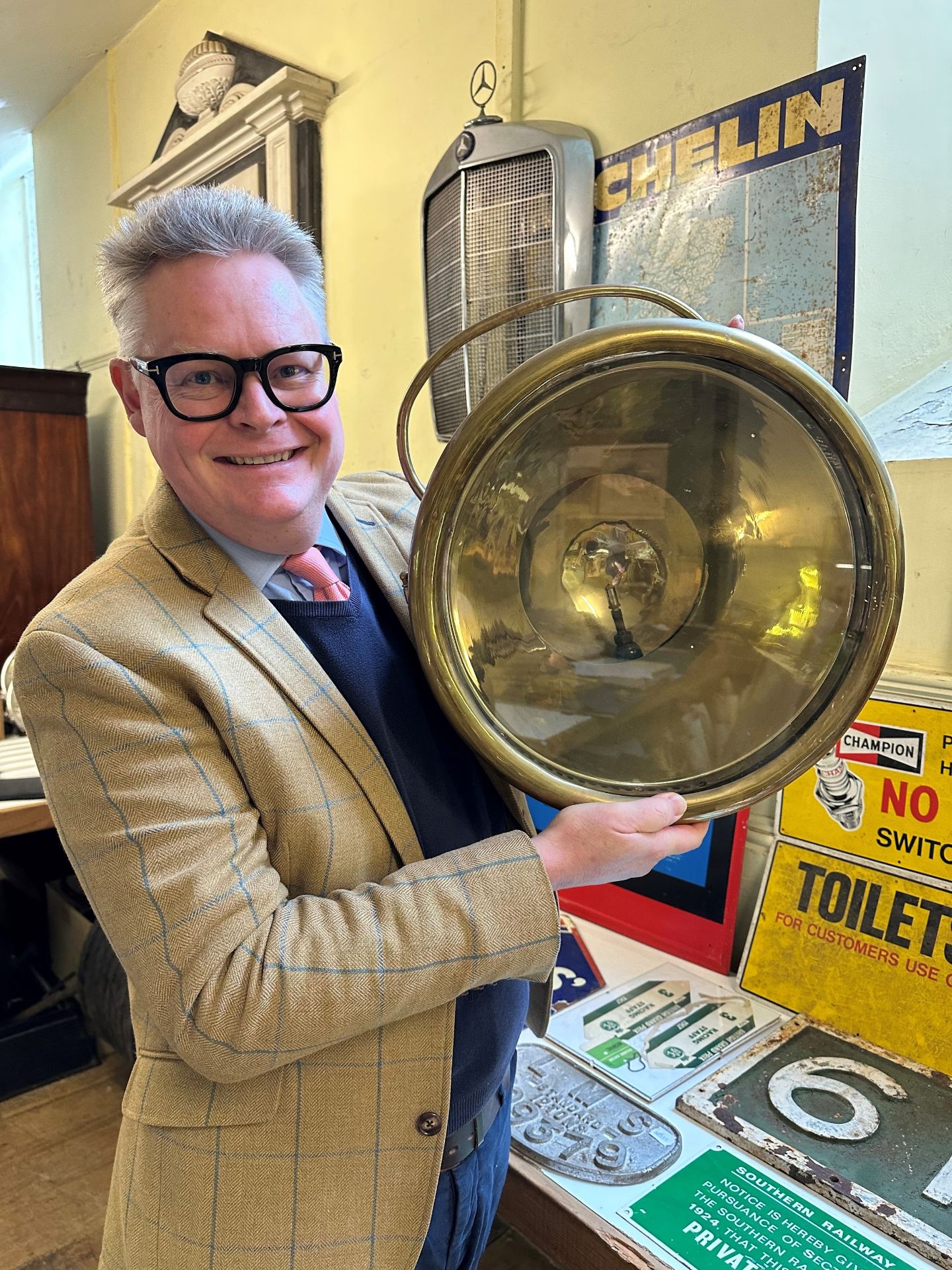 An early 20th century large Willocq Bottin acetylene brass headlamp, with a copper handle, stamped