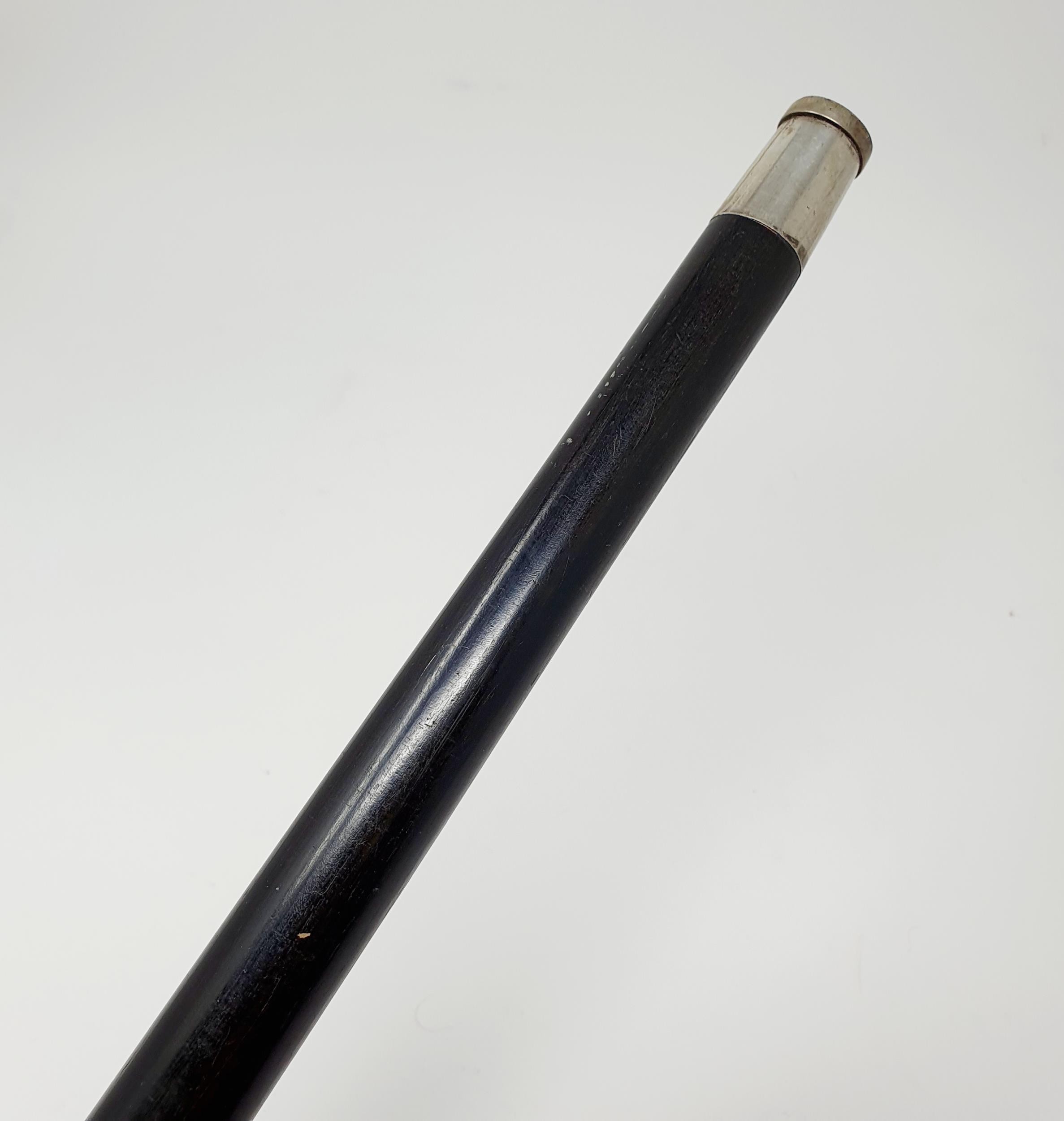 A late 19th/early 20th century Indian ebony and silver mounted walking stick, 93 cm Provenance: - Image 5 of 7
