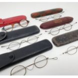 A pair of 19th century spectacles, and assorted other spectacles (box)