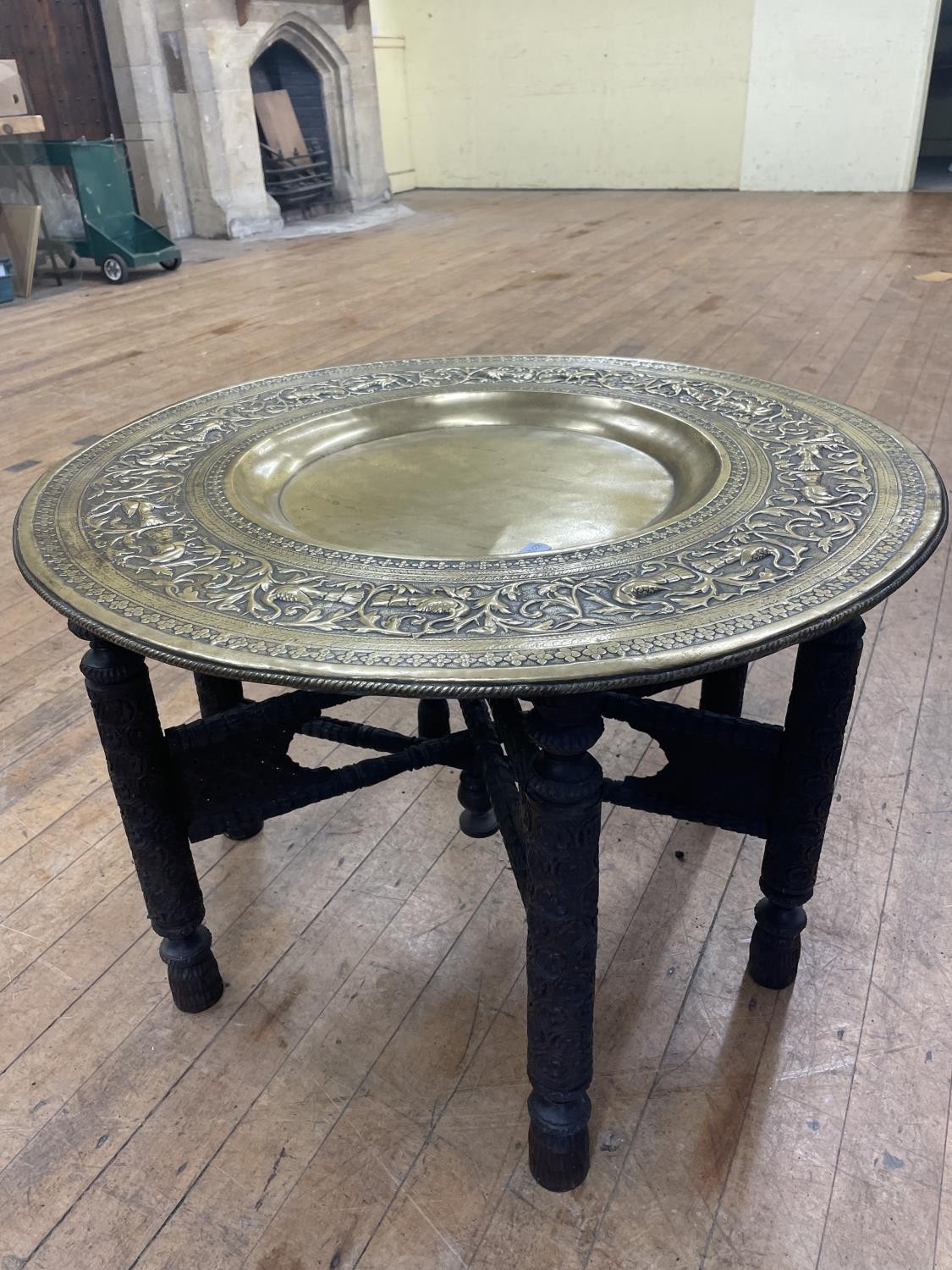 A rosewood octagonal table, 61 cm wide, an adjustable piano stool, a drop leaf table, a Benares