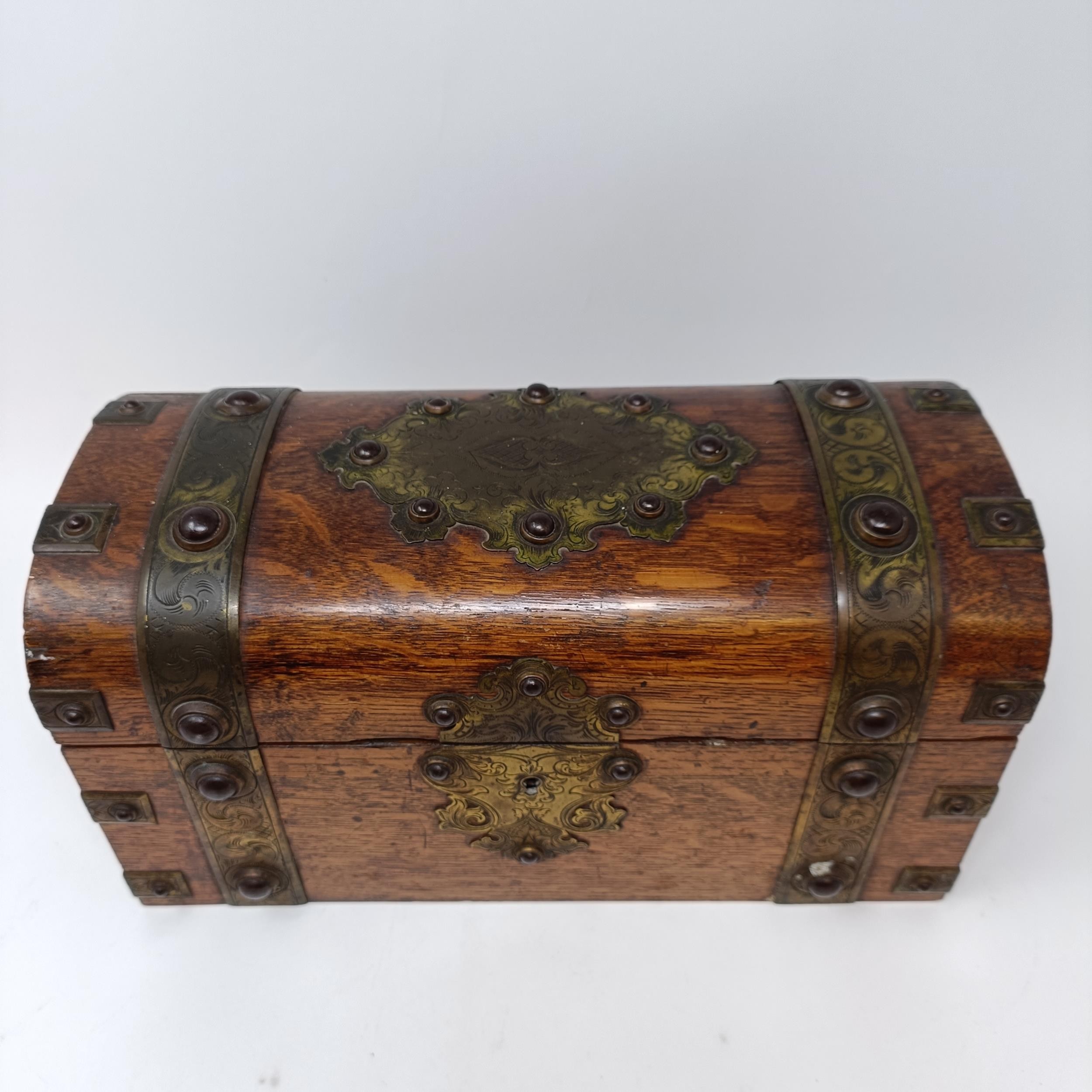 *** Withdrawn***A 19th century oak and brass bound tea caddy, with a hinge lid to reveal - Image 9 of 11