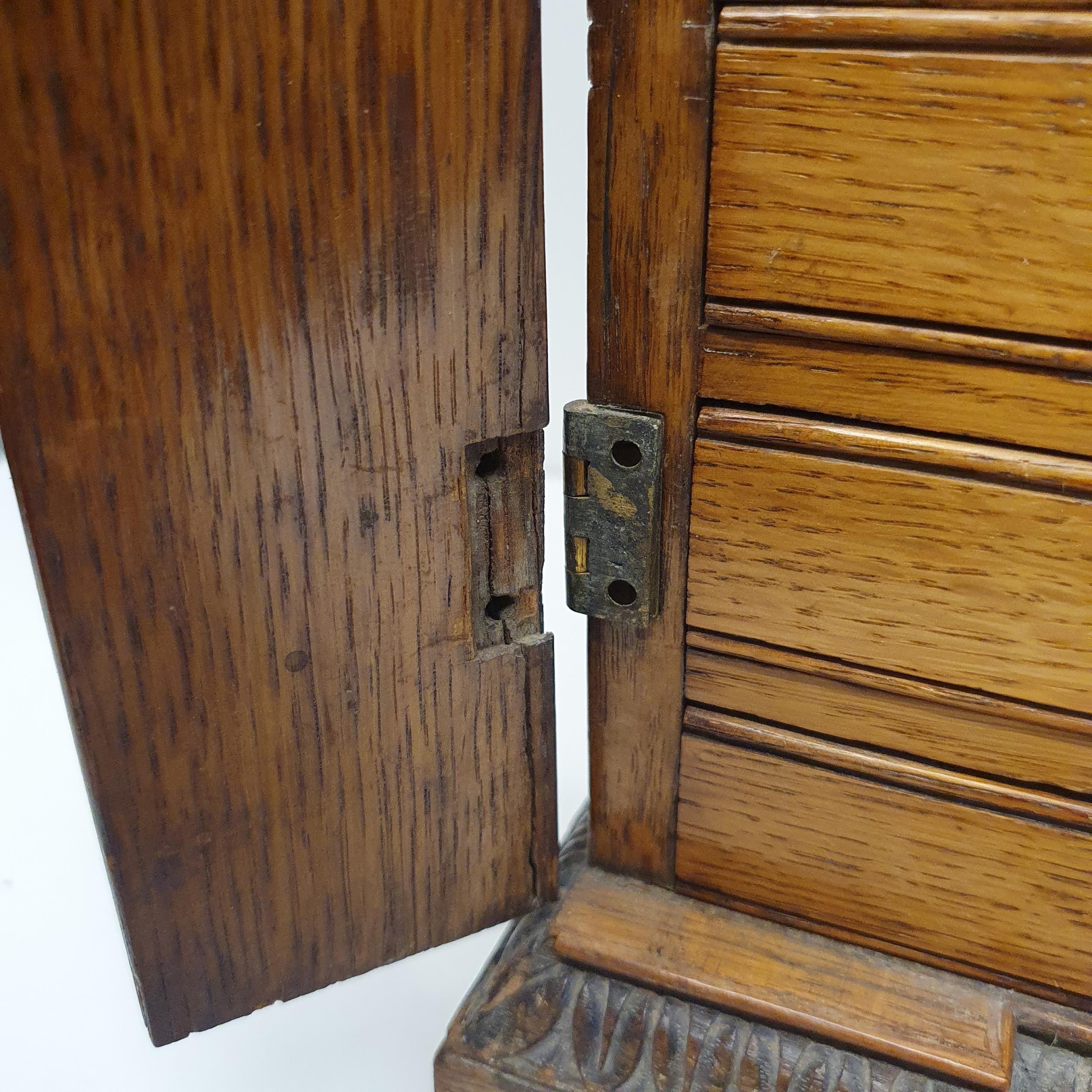 A late 19th century oak collectors chest, with a floral carved frieze, fourteen drawers, 70 cm x - Image 5 of 8