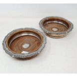 A pair of Old Sheffield plate bottle coasters, 17 cm diameter