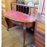 A 19th century Irish bow front writing desk, the superstructure having six drawers, and pigeon