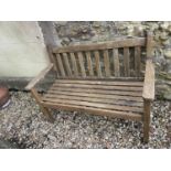 A teak garden bench 120 cm wide