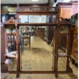 An Aesthetic Movement walnut framed overmantel mirror