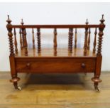 A 19th century rosewood Canterbury, with a single frieze drawer, 66 cm wide Depth 36 cm height 53