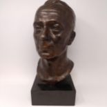 Joseeheu, bronze bust of a man, on a painted wooden base, signed and dated 1932, 46 cm high