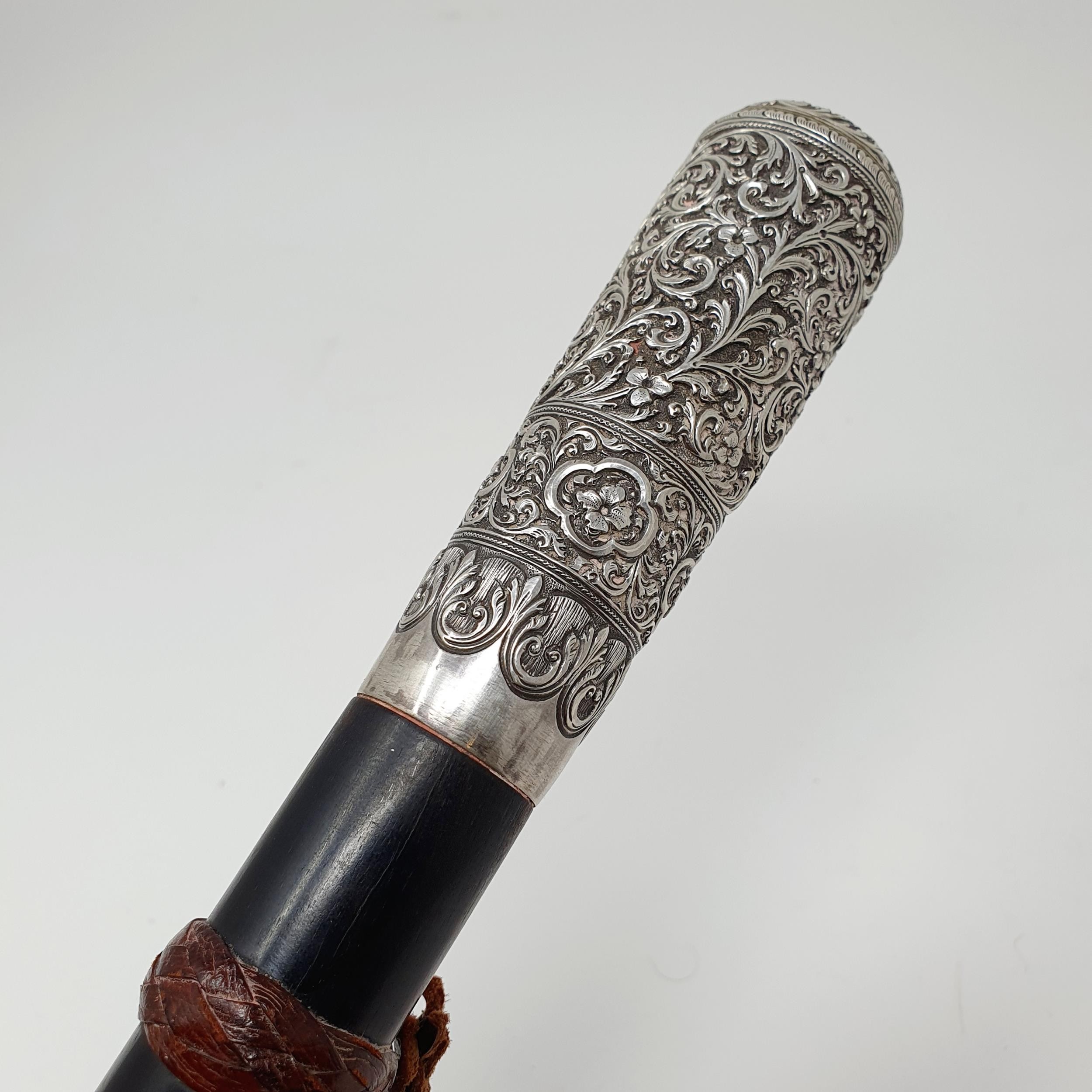 A late 19th/early 20th century Indian ebony and silver mounted walking stick, 93 cm Provenance: - Image 2 of 7