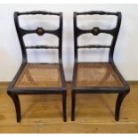 A pair of 19th century ebonised bar back single chairs, and a pair of oak chairs (4)