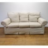 A cream three seater sofa, 163 cm wide