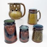 A modern stoneware jug, assorted mugs, assorted figures, assorted stamps, a penknife, a decanter,