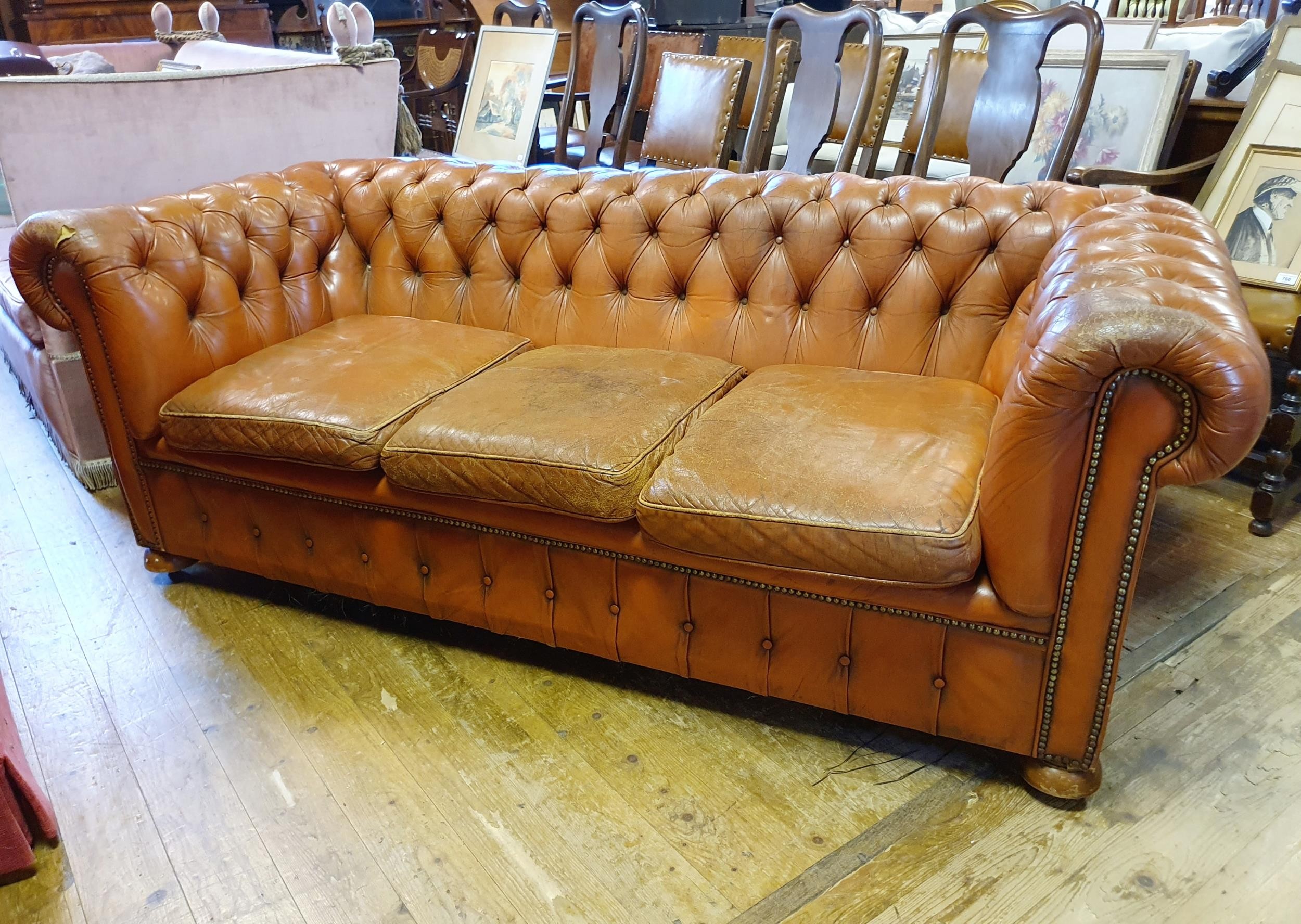 A leather button back Chesterfield sofa, 200 cm wide