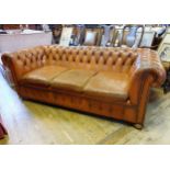 A leather button back Chesterfield sofa, 200 cm wide