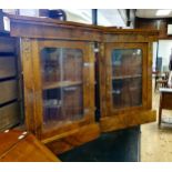 A pair of walnut corner cabinets, with glazed doors, with gilt metal mounts, 80 cm wide Probably