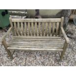 A teak garden bench, 150 cm wide